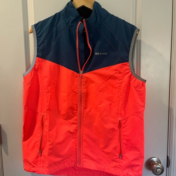 SUGOI Navy and Neon Pink Cycling Jacket-versa full zip 2/1 magnetic - Picture 13 of 14